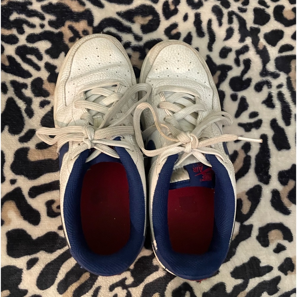 blue and red nike forces